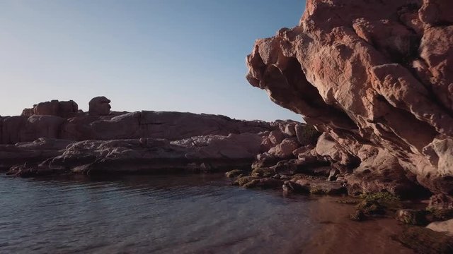 Aerial cliff to sea. Camera moves to cliffs. Wideshot in fullhd