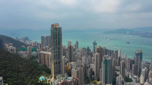sunny day hong kong cityscape victoria harbour traffic aerial panorama 4k