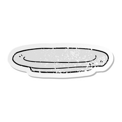 distressed sticker of a cartoon plate