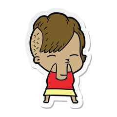 sticker of a cartoon squinting girl