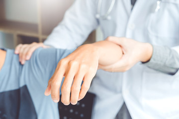 Fototapeta premium Doctor consulting with patient Shoulder problems Physical therapy diagnosing concept