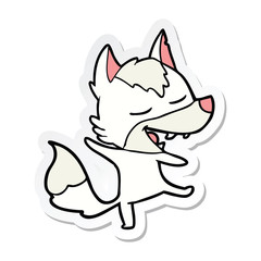 sticker of a cartoon wolf laughing