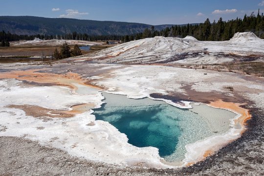 Doublet pool with mineral deposits, at back Lion Group, Upper Geyser Basin, Yellowstone National Park, Wyoming, USA, North America