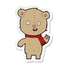 sticker of a cartoon waving teddy bear with scarf