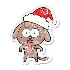 cute distressed sticker cartoon of a dog wearing santa hat