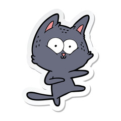 sticker of a cartoon cat dancing