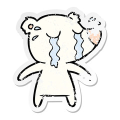 distressed sticker of a cartoon crying polar bear