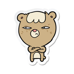 sticker of a cartoon angry bear