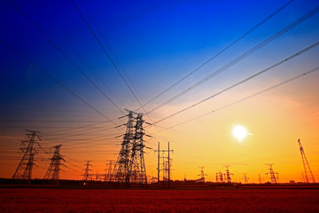 Fototapeta premium Electric tower, silhouette at sunset