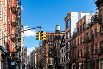 Historic buildings along Spring Street on a bright sunny day in Manhattan, New York City NYC