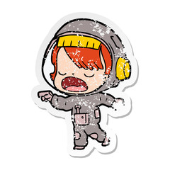 distressed sticker of a cartoon talking astronaut