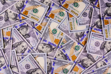 Fototapeta premium Background of the many american one hundred dollar banknotes