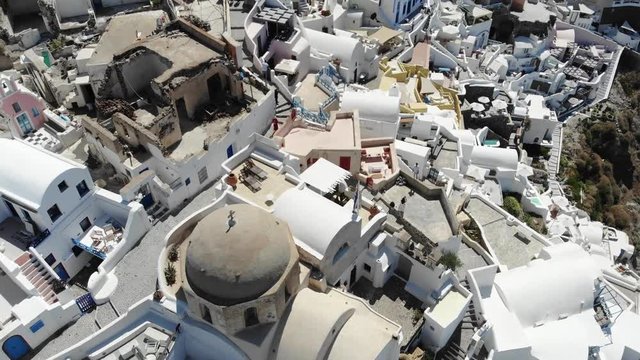 Cinematic aerial view of world famous Greek Island called Sanotrini