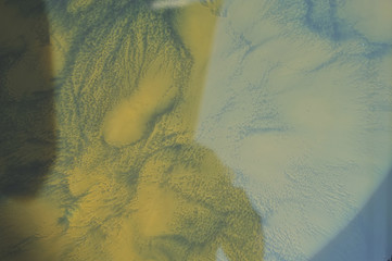 Dyeing fabric with indigo water.