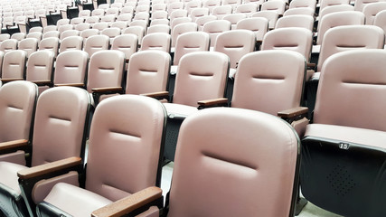row of empty chairs, seats in lecture hall