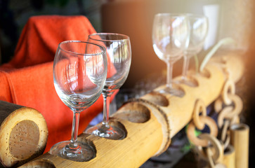 Crystal clear wine glass on bamboo in local restaurant