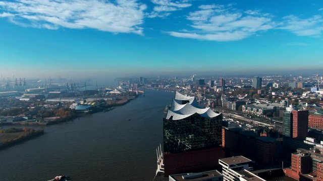drone flight aerial over Elbphilharmonie hamburg harbor ocean boats navy nautical river elbe concert hall