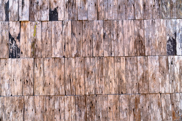 Pattern of old wooden house wall made from small wood pieces connected together is unique. (2)