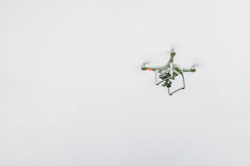 drone with high resolution digital camera on the sky