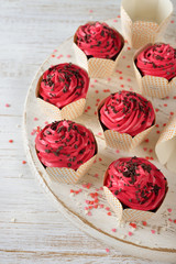 Chocolate cupcakes with pink icing