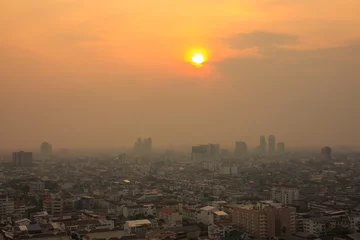 Poster Bangkok city buildings cityscape on the sunset. Big city life © Vitaliy
