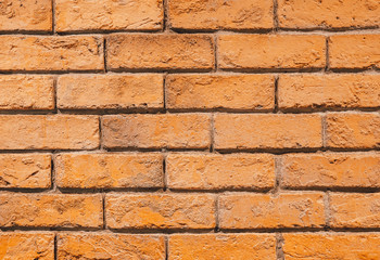 Close up old red stone brick wall texture background