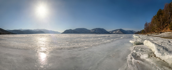 mountains lake frozen ice sun pine