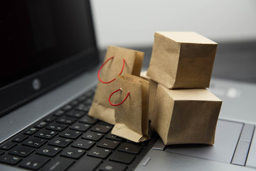 Purchases - packages and boxes. Online shopping and sale concept.