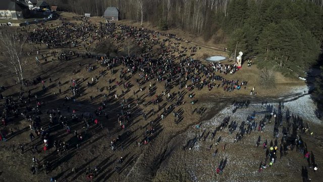 Aerial view of open-air Spring festival event in Lithuania. It's called Uzgavenes (shrove tuesday).