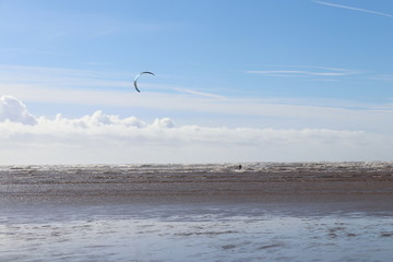 kite surfing on beach