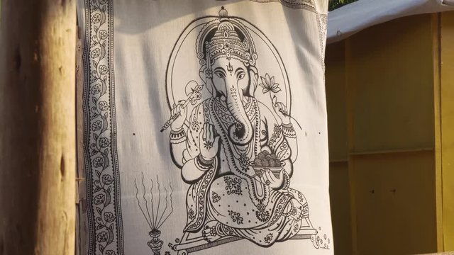 Lord Ganesha Sequin Cotton, fabric material Painted canvas hanging in doorway, India.