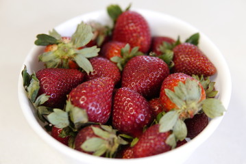 delicious strawberrys seasonal red fruits freshly cut on granite table