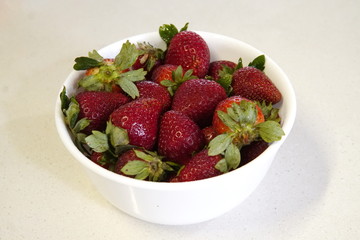 delicious strawberrys seasonal red fruits freshly cut on granite table