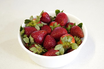delicious strawberrys seasonal red fruits freshly cut on granite table