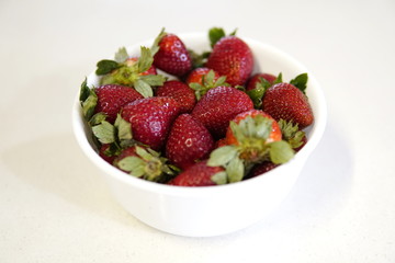 delicious strawberrys seasonal red fruits freshly cut on granite table