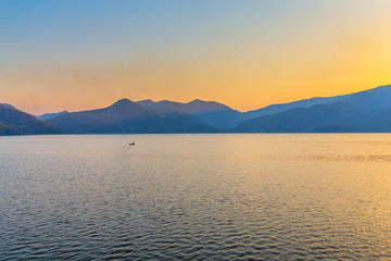 Landscape of sunset on Mountain In the reservoir  Sukhothai,Thailand