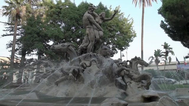 Full view slow motion pan of the fountain- Fontana Di Proserpina in Catania, Italy