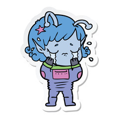 sticker of a cartoon crying alien girl