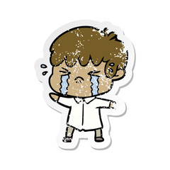 distressed sticker of a cartoon boy crying