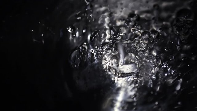 Close up footage of gauges, copper stills and gin being distilled in this step by step process of how to make gin