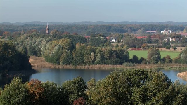 Lake and village at Biosph&auml;renreservat Schorfheide-Chorin, Germany.