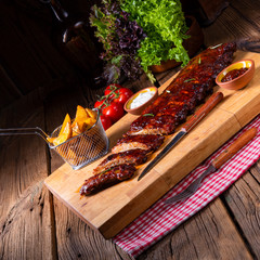 delicious grilled ribs with barbecue barbecue sauce