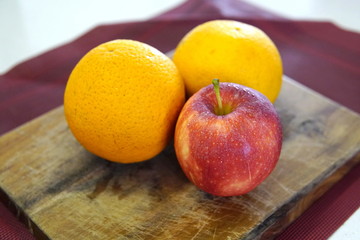 orange pear and apple prepared for a fresh and nutritious salad