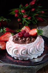 light pavlova with fresh fruits and chocolate