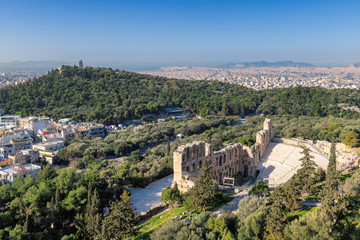 Fototapeta na wymiar Odeon of Herodes Atticus on Acropolis hill in Athens, Greece with view on the Athens city.