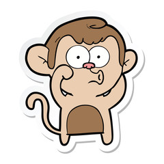 Obraz premium sticker of a cartoon hooting monkey