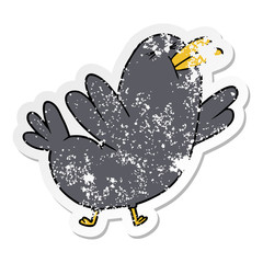 distressed sticker of a cartoon blackbird