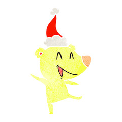 laughing bear retro cartoon of a wearing santa hat