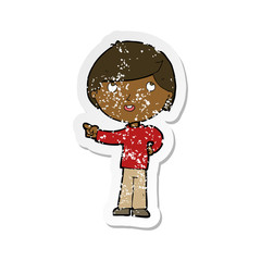 retro distressed sticker of a cartoon boy pointing