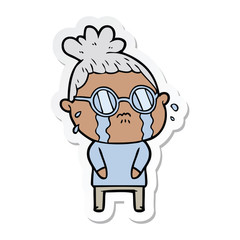 sticker of a cartoon crying woman wearing spectacles